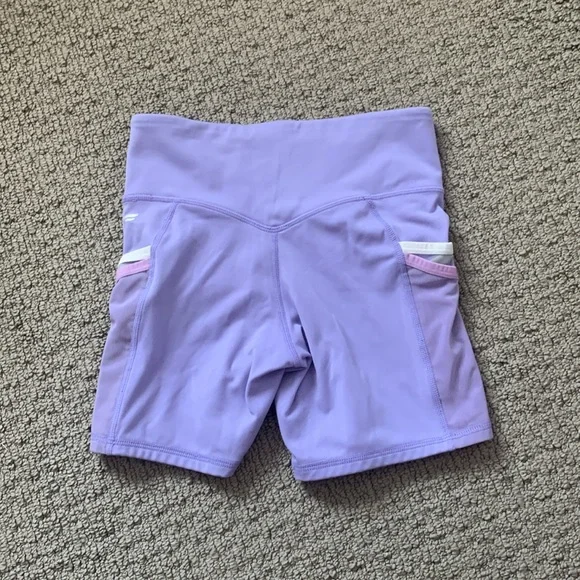 Purple fabletics biker shirts with colorful leash pockets! - Picture 2 of 5
